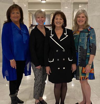 High school friends, Judy Rash Gruner, Jana Philpott Lipscomb, Julie Zisman Williams and many other friends and colleagues were on hand when Delilah Calfy Joiner Martin (second from right) was honored at the Oklahoma State Capitol as 2024 Oklahoma Mother of the Year.